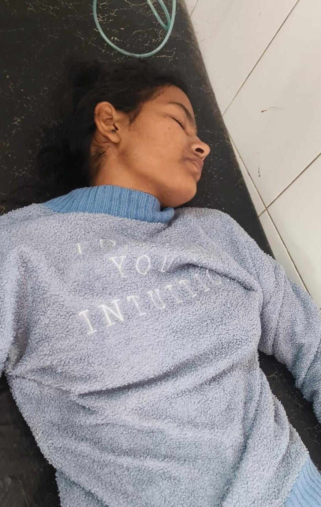 Student injured after falling from first floor of college