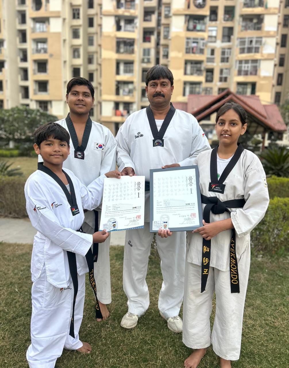Angel and Yagya received their First Dan Black Belts.