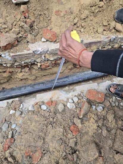 The water corporation is laying pipelines at a shallow depth, raising concerns about potential bursts.