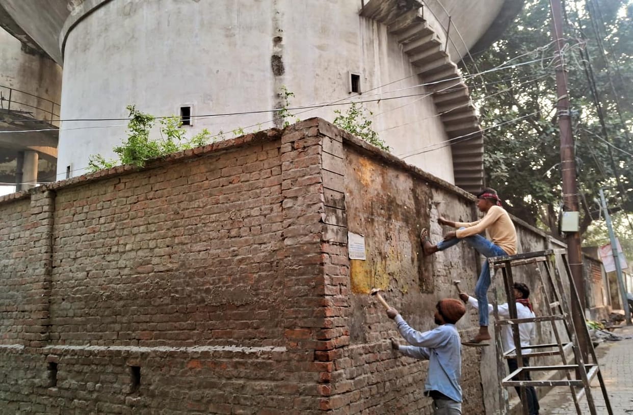 Repair work has begun on the walls of the overhead water tank premises.
