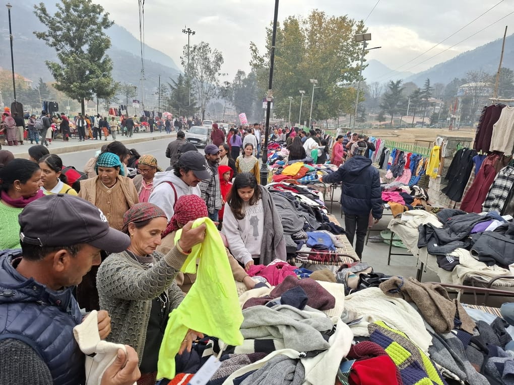 Crowds of people gathered to shop at the Sunday market
