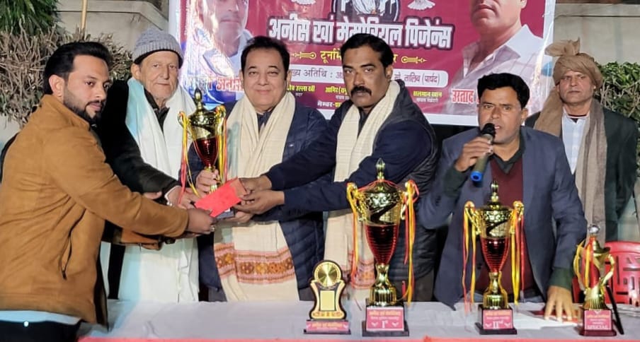 Arshad won the trophy in the pigeon racing competition.