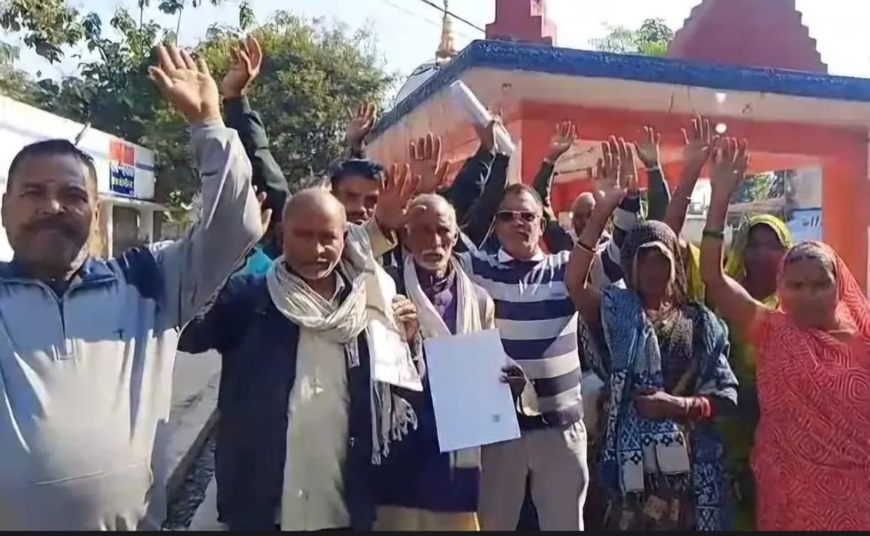 The village head's son is accused of extorting 660,000 rupees; a protest was held at the police station.