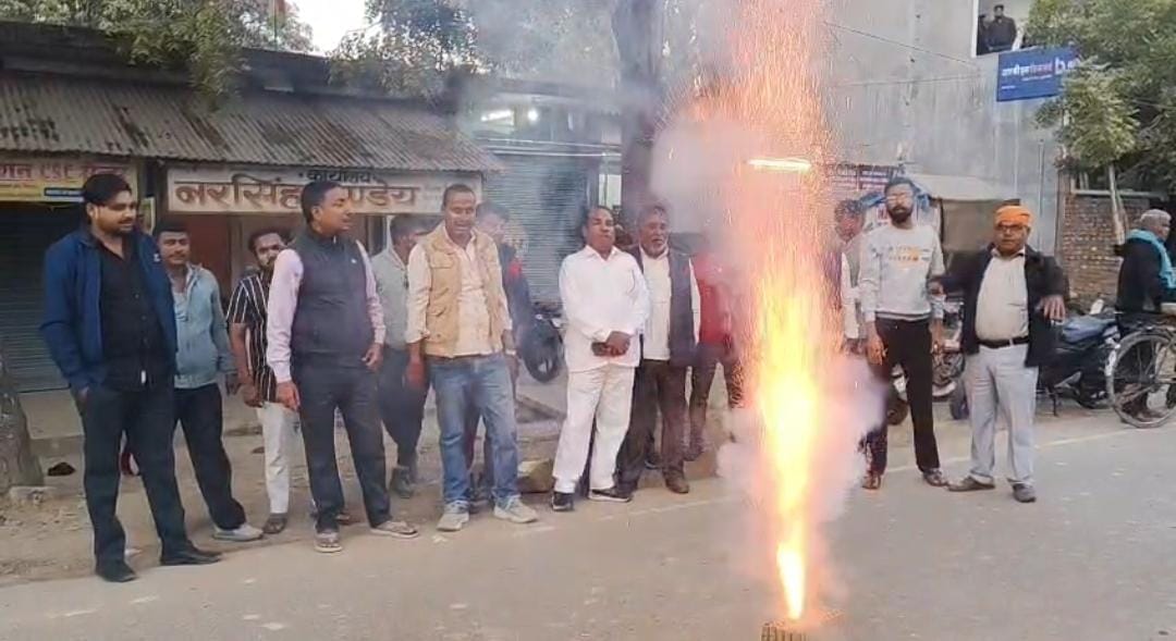 Supporters celebrated, distributed sweets and burst firecrackers.