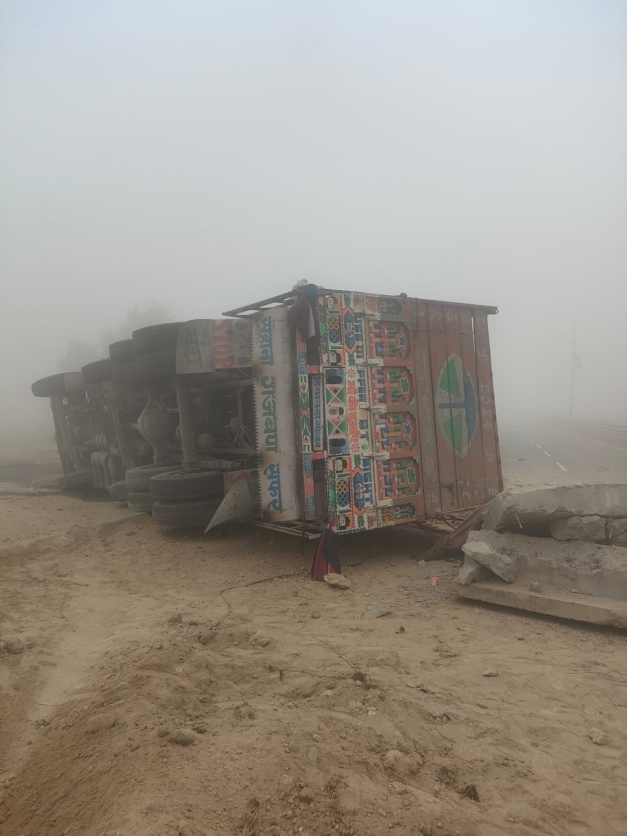 A truck overturned in the fog, and a bus was also involved in an accident.