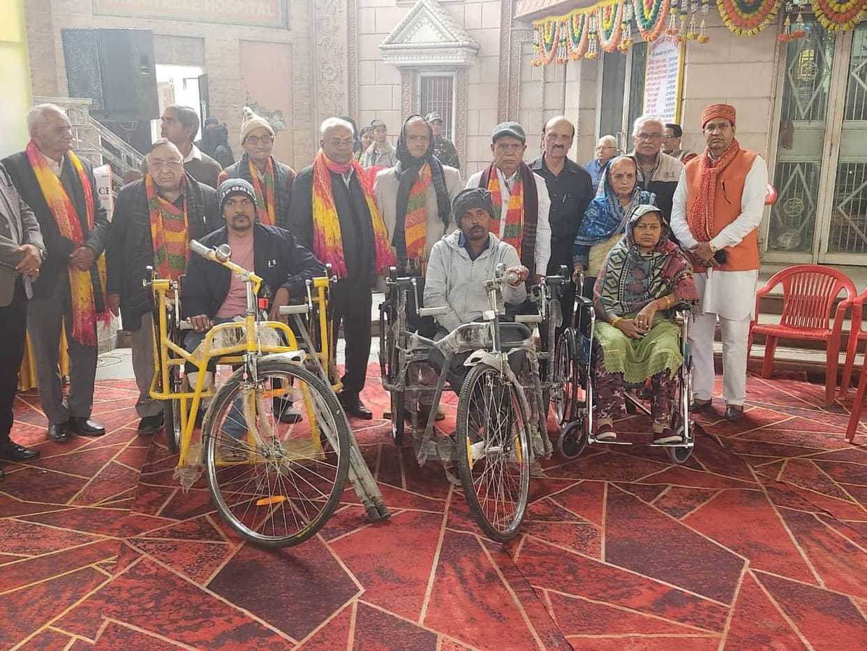 Tri-rickshaws, wheelchairs were distributed to persons with disabilities, and sewing machines were distributed to women.