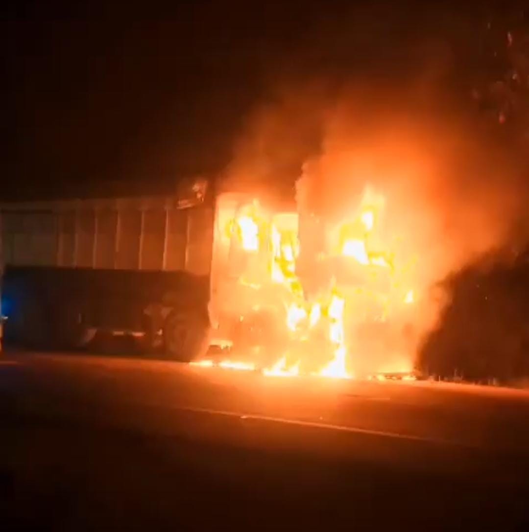 A moving truck turned into a ball of fire; the driver saved his life by jumping out.