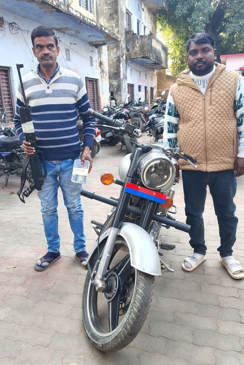 Two accused of brandishing rifles on bike arrested