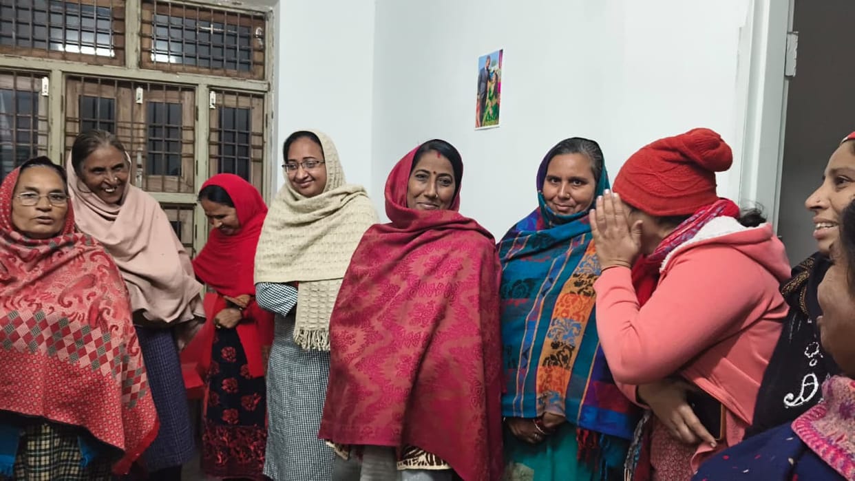 Women on duty for water at 12 midnight on a cold night, sleep disrupted by night supply in winter