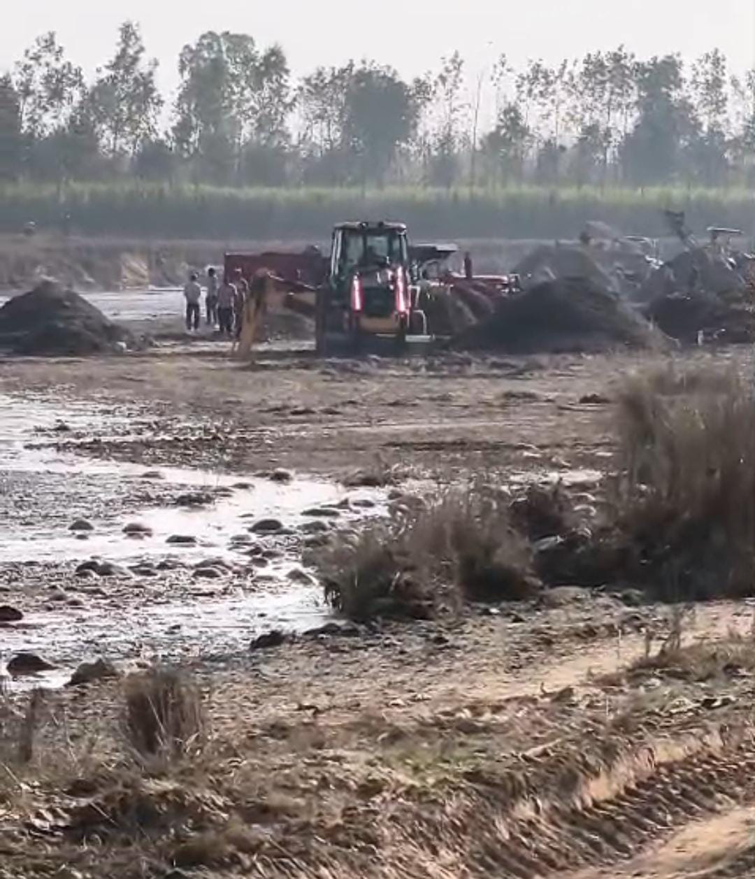 Two JCBs and two tractor-trailers were seized in connection with illegal mining