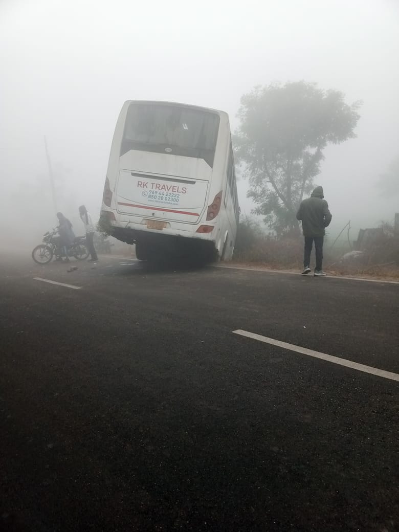 Private bus and truck collide, bus goes off the road