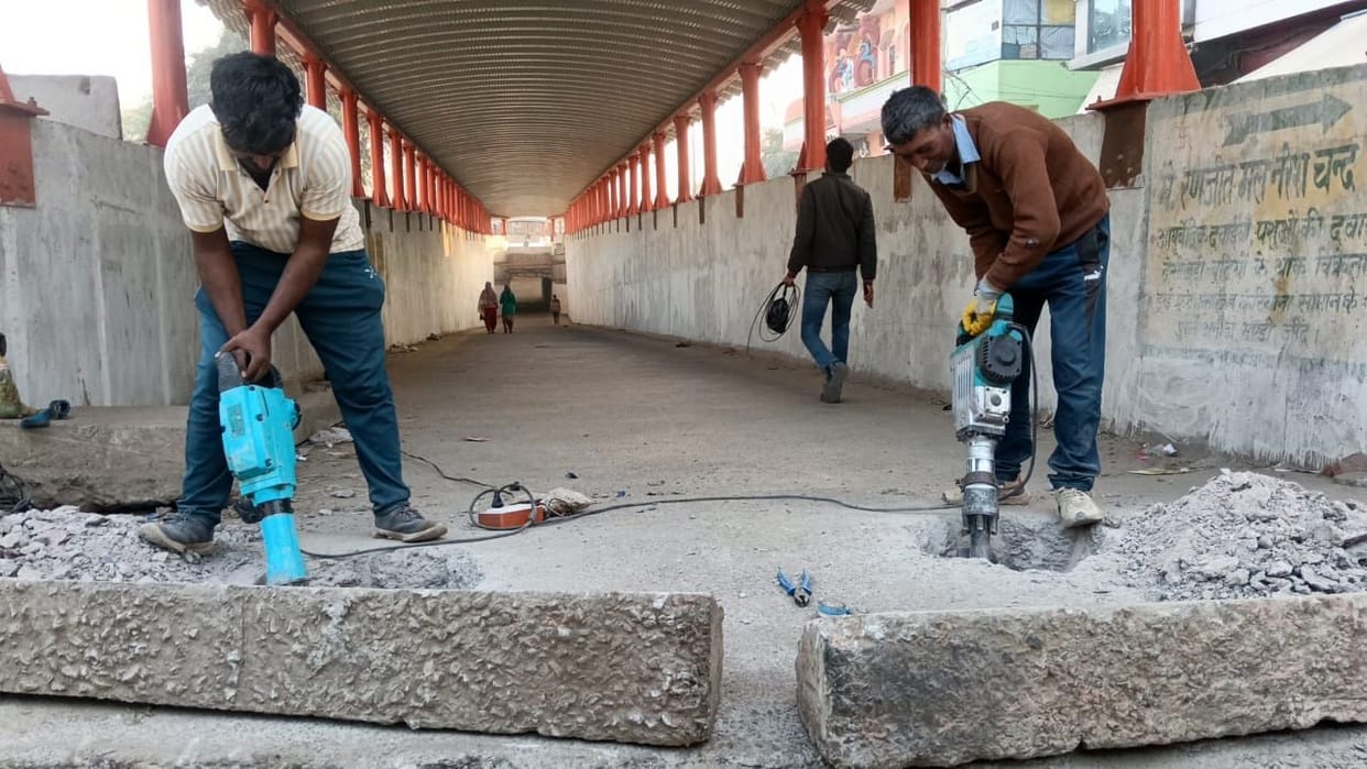 Work has begun on installing barriers at the underpass, which will provide relief.