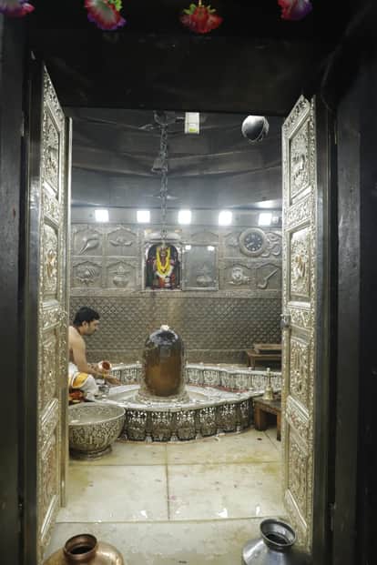 After 20 years, Baba Mahakal's silver gate replaced with Nandi, Om, Trishul and Kalash carved on it.
