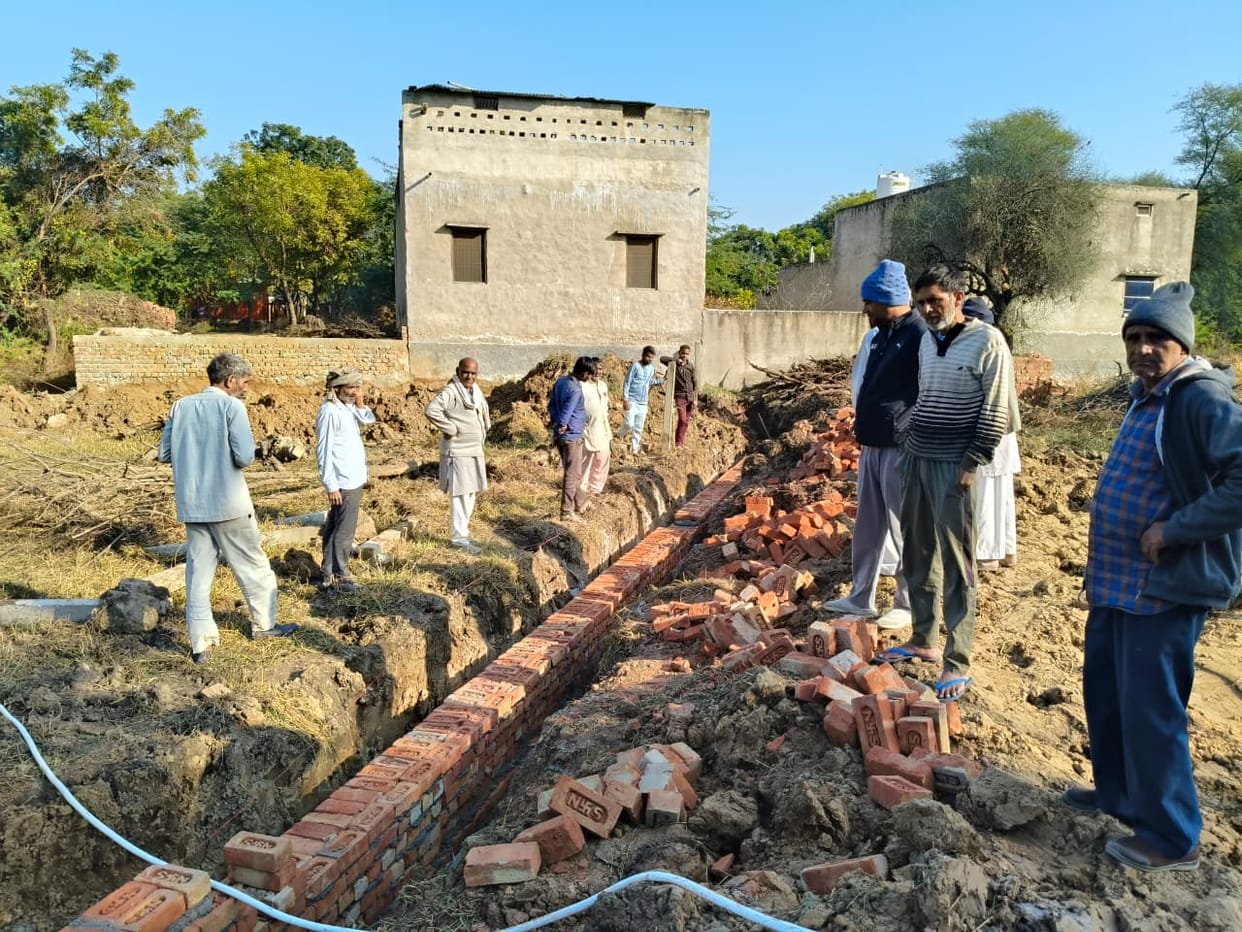 Villagers raised slogans against the use of substandard material in the construction of boundary wall.