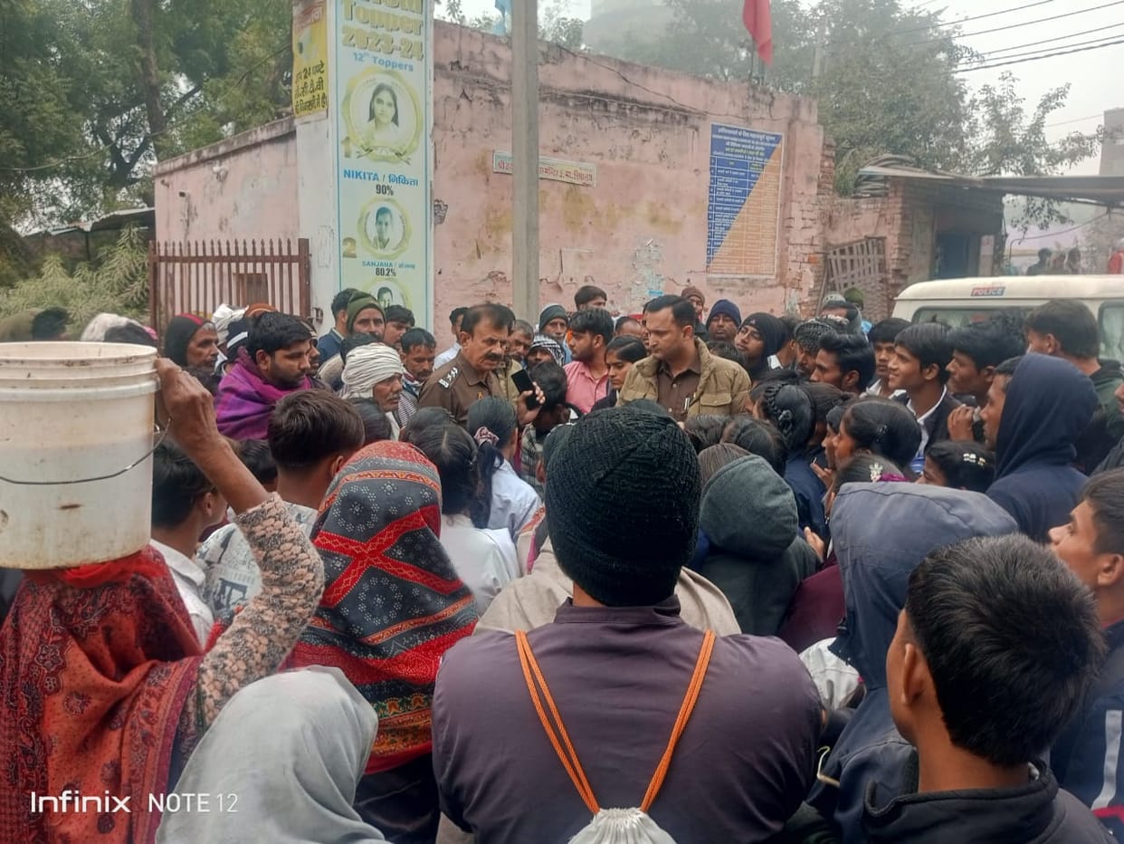 Students, angered by the suspension, blocked the road