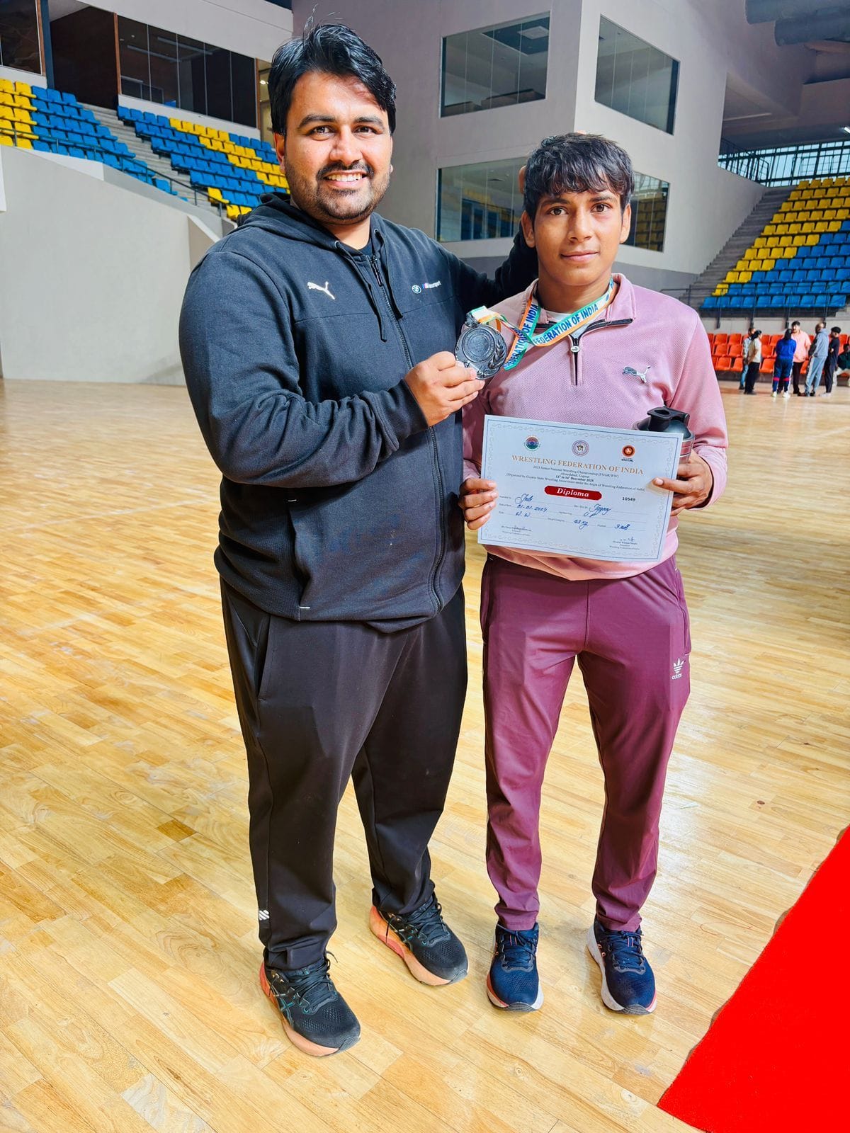 Julie won a bronze medal at the Senior National Wrestling Championship.