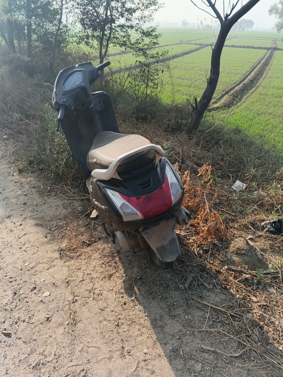 The scooter that was stolen from the shopkeeper after throwing dirt in his eyes was found parked nearby.