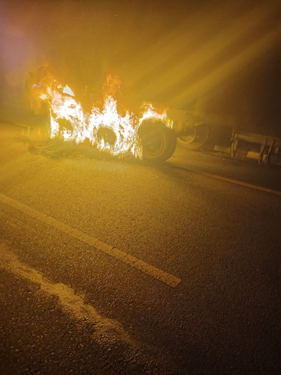Tires of a trailer carrying tiles caught fire on the expressway.