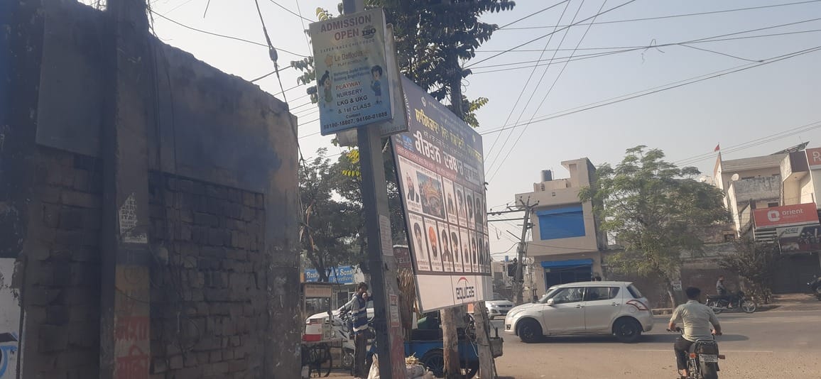 Illegal hoardings and billboards in the city are adding to the problems caused by the fog