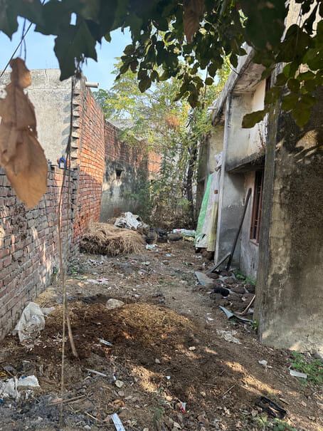 Piles of garbage pile up in Shahpur village, increasing the risk of diseases.