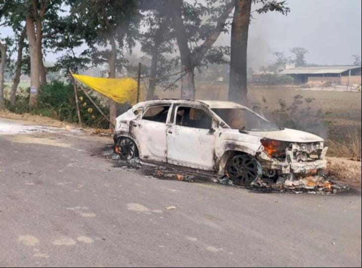 Moving car caught fire...saved life by breaking the gate