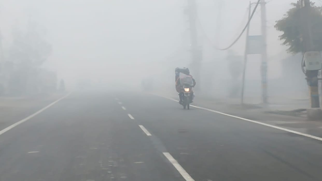 Dense fog slowed down traffic; vehicles crawled along the roads