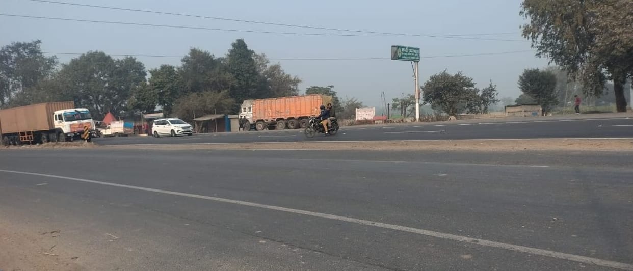 Highway of accidents: The road divider is broken...and the overpass railing is also missing.