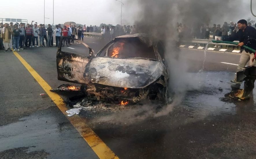 Car hits railing on Purvanchal Expressway, overturns, catches fire