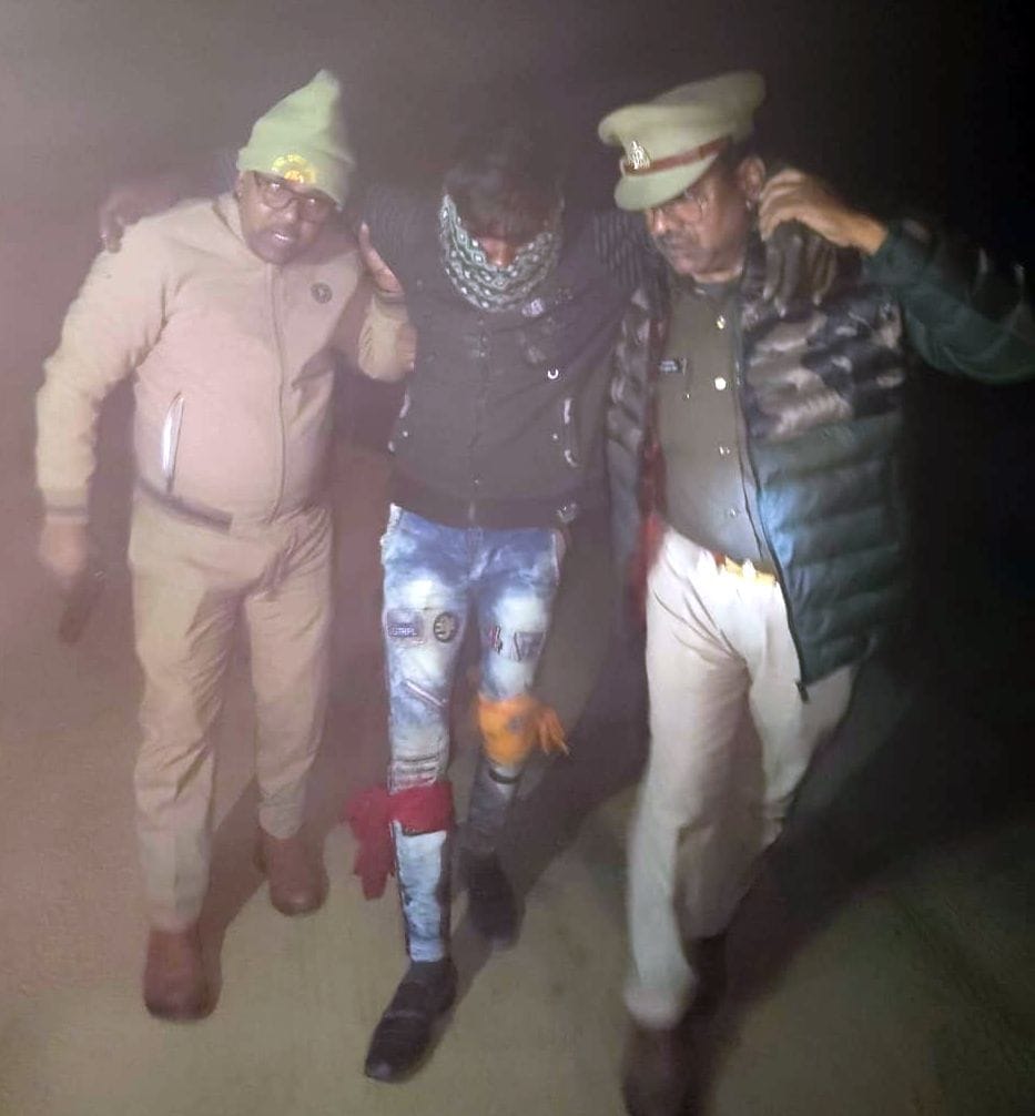 The woman was strangled to death after being raped; the accused was injured in an encounter after being shot in both legs.