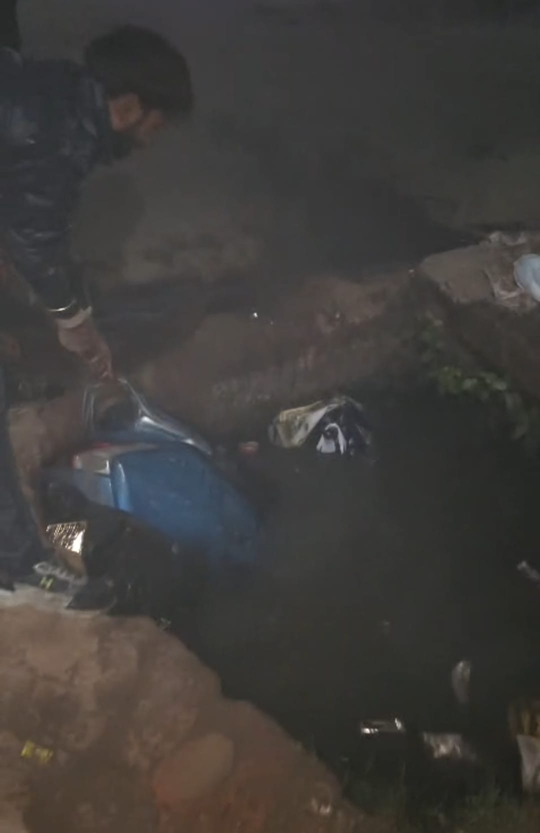 A scooter rider was injured after falling into an open sewer in the cantonment area.