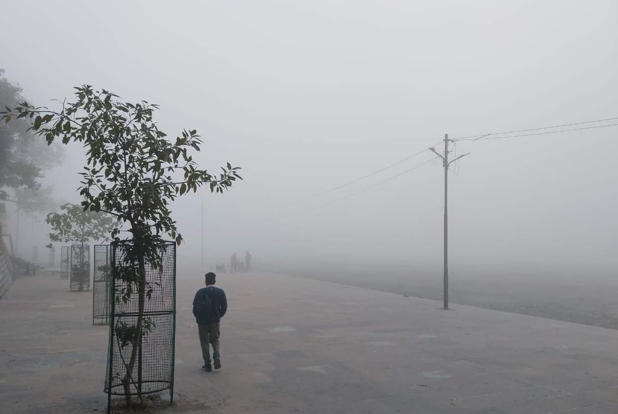 Pilgrim town shrouded in fog