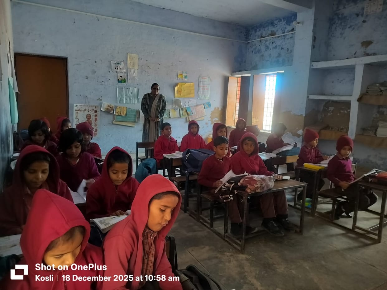 School windows are broken, children are studying in the cold wind.