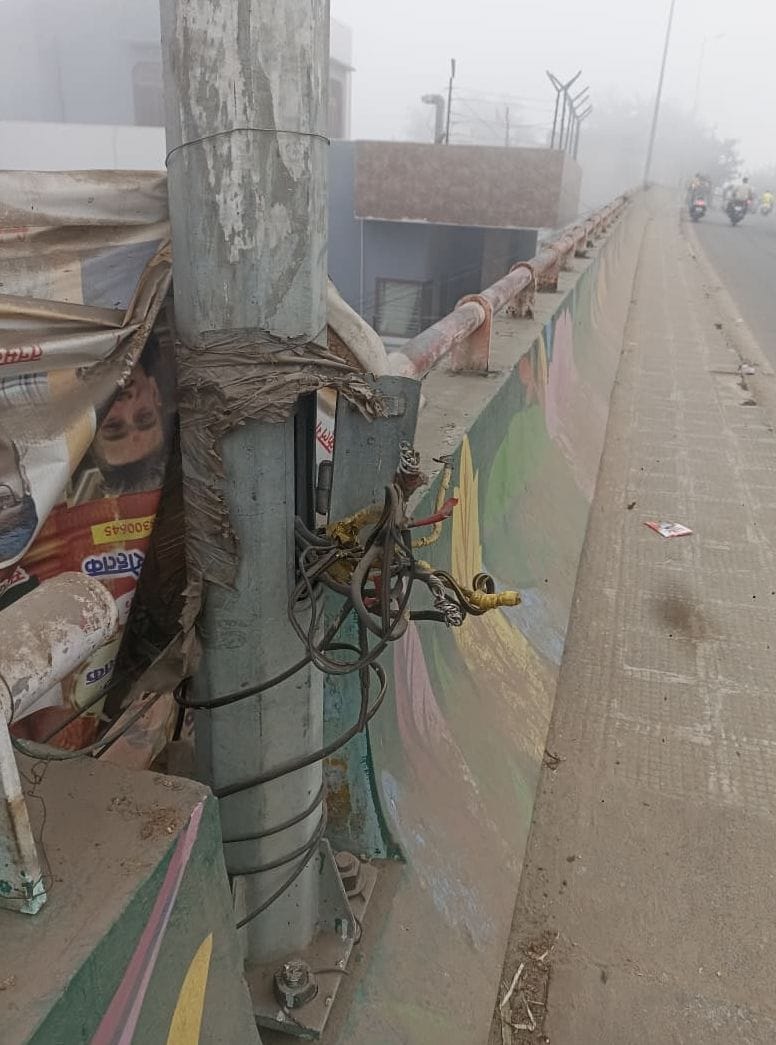 Street light poles have been installed on the dividers by the municipal corporation.