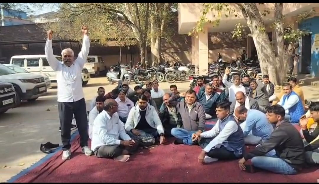 Employees staged a two-hour protest against the transfer policy.