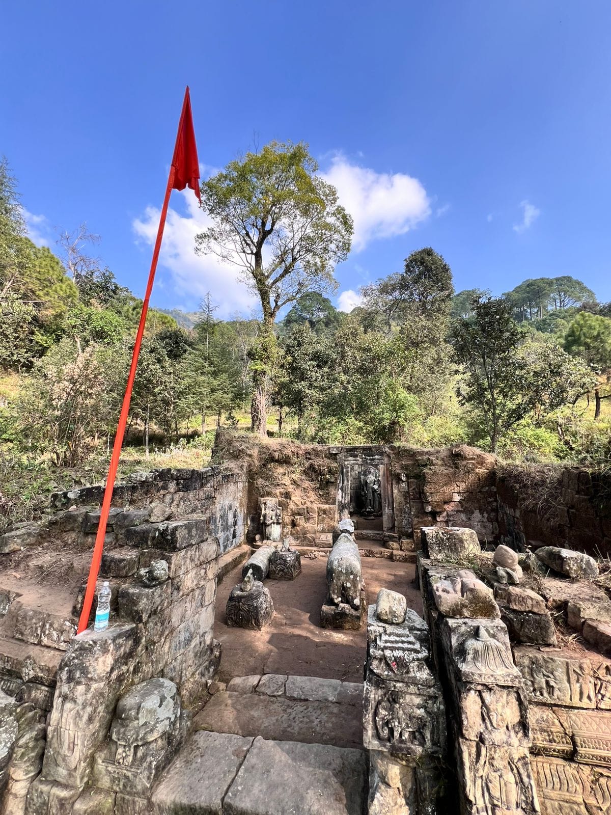 The archaeological department halted excavation work after discovering temple remains and statues.