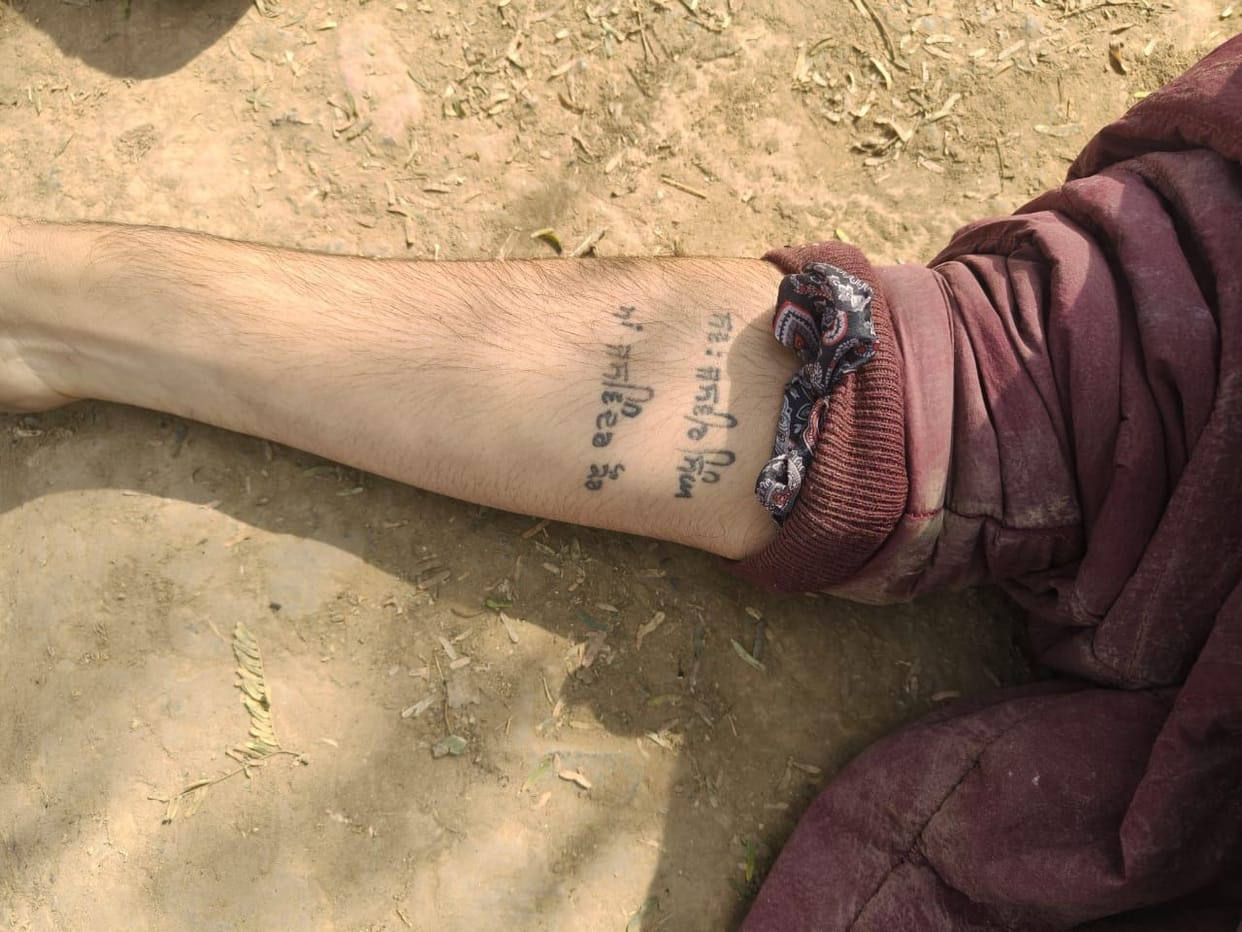 The young man's body was found in the bushes; he had an AK-47 tattoo on his arm.