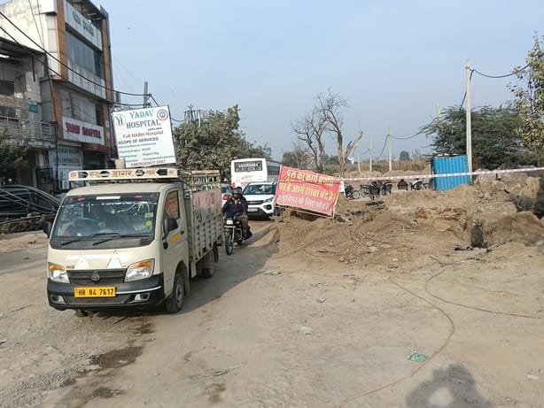 Heavy vehicles continue to ply during the construction of the Rohtak Road Road Road Road Road, with officials limited to warnings instead of taking action