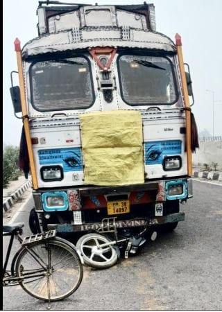 Bike rider trapped in truck and dragged for 300 meters, dies