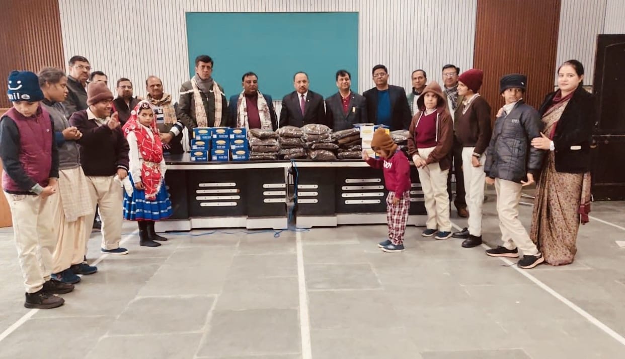 Lions Club Jind City donated track suits and shoes to students at Ankur School