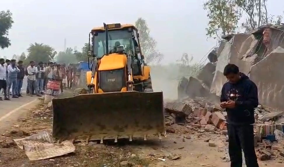 Bulldozers were run on nine shops built on government land
