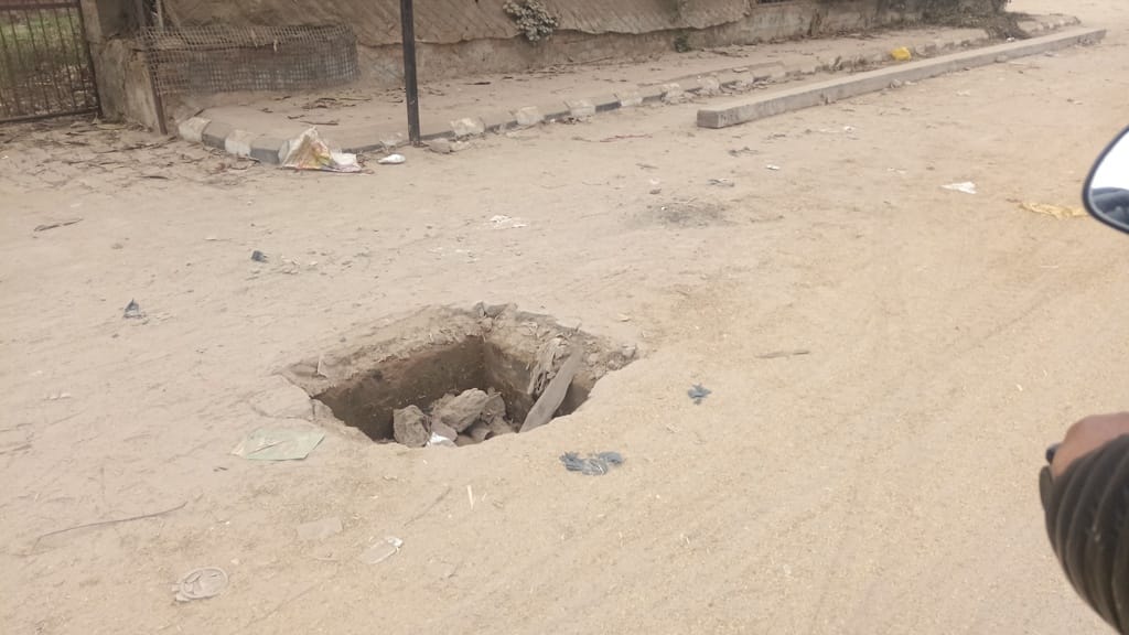 Open sewerage manholes and broken lids are inviting accidents in the city