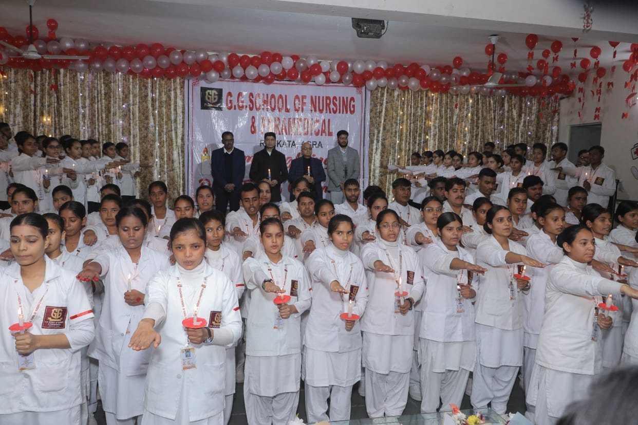 Holding candles in their hands, nursing students took an oath of service and dedication.