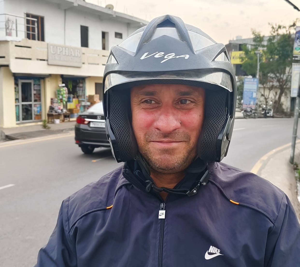The potholes were filled with mud, and people said, "At least they could have patched them with tar. How long will the mud last?"