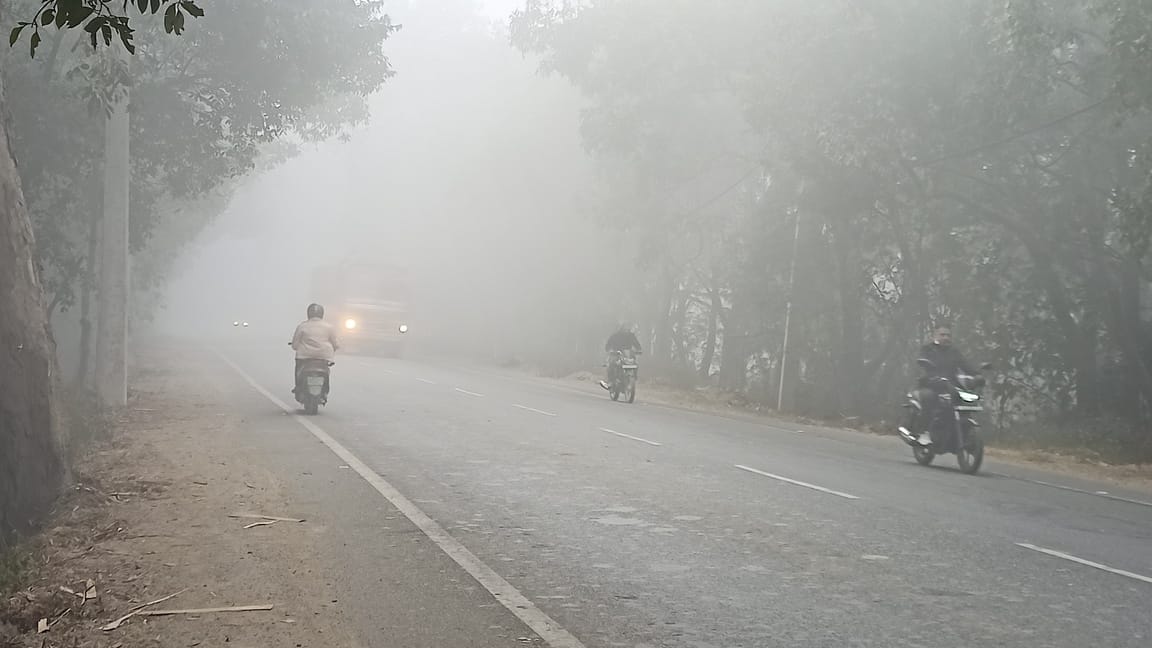 Vehicles crawled along the roads due to dense fog