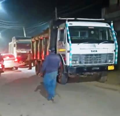 Villagers blocked the road, stopping the dump trucks leaving the village