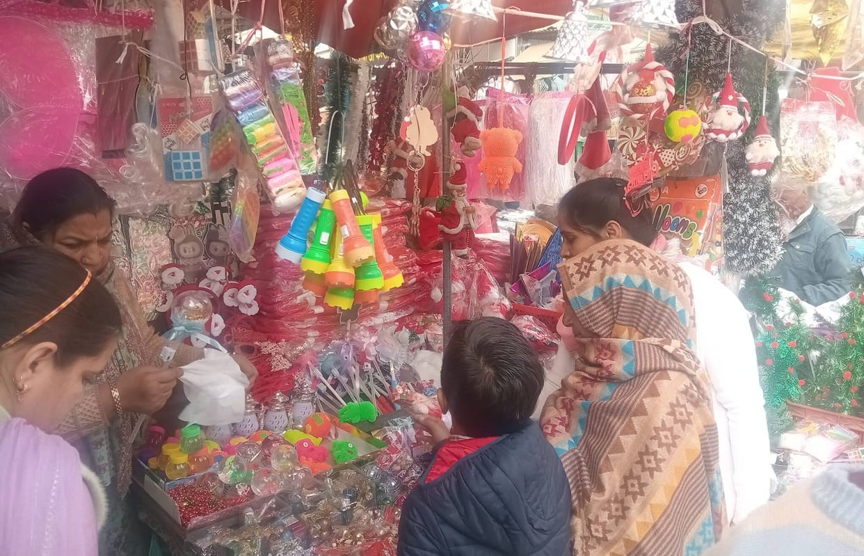 Shops decorated with Christmas trees, jingle bells, Santa dresses