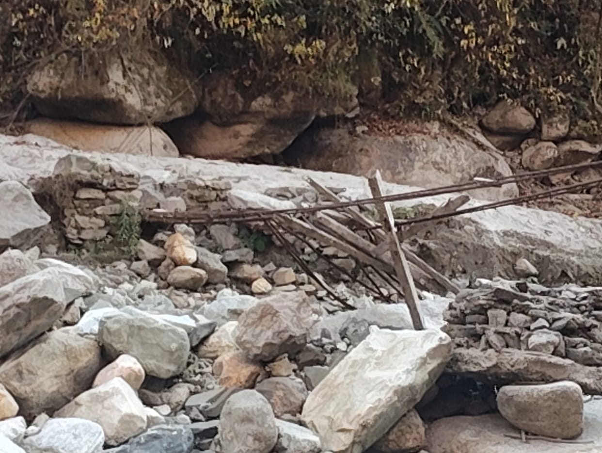 The bridge submerged in the Niharni dam ten years ago, has not been rebuilt.