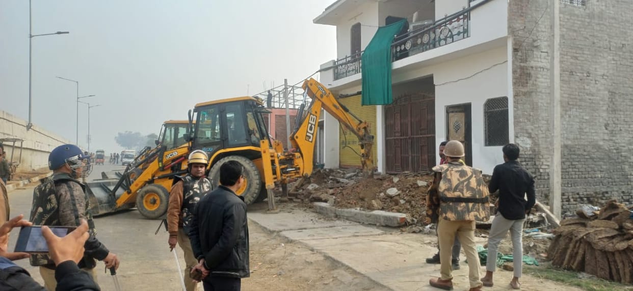 The administration removed encroachment from the service lane of the highway and bulldozers were used.