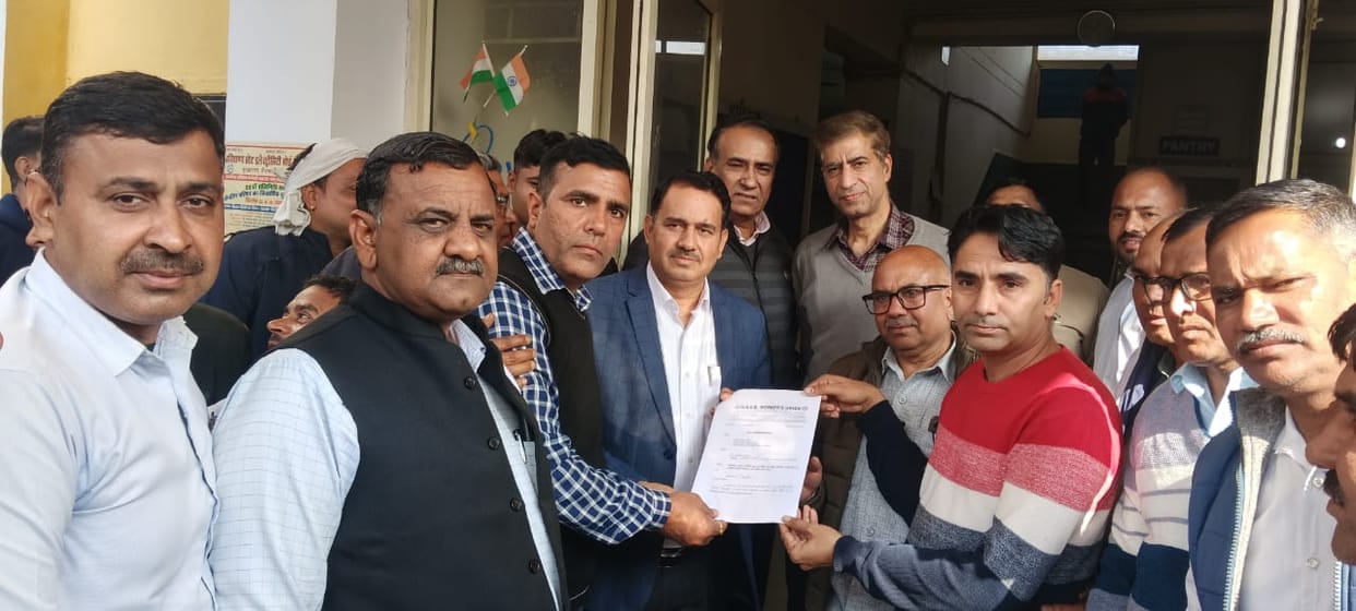 Employees protest against the online transfer policy.