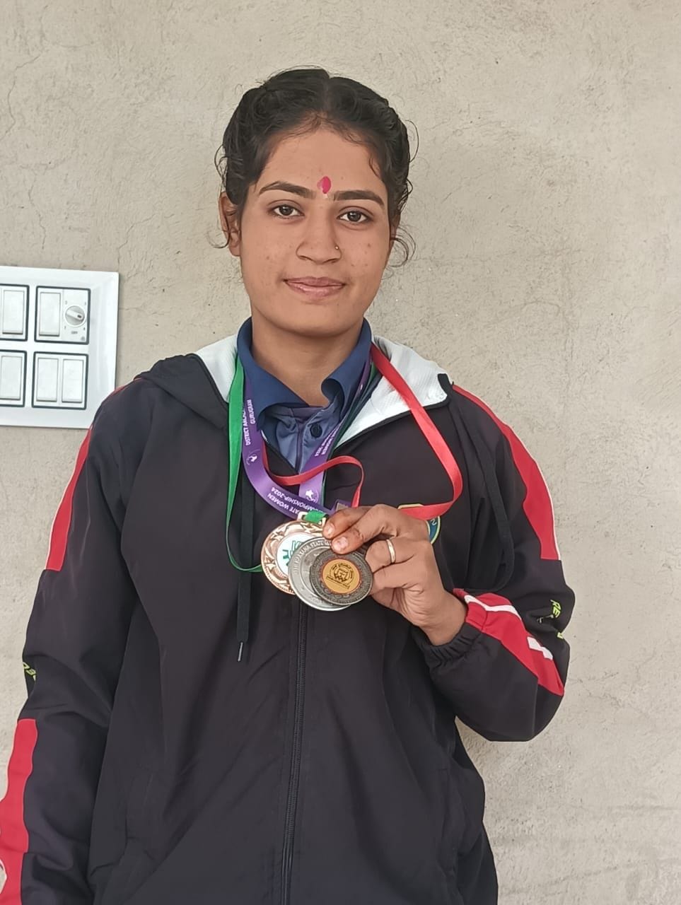 Archer Gita has won three medals in three years, winning gold for the target-country